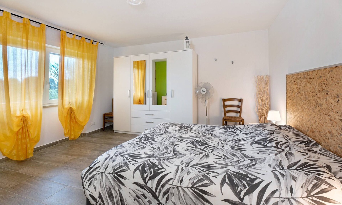 Arona Apartment | Apartment 'Bambù' with Private Garden, Balcony and Wi-Fi