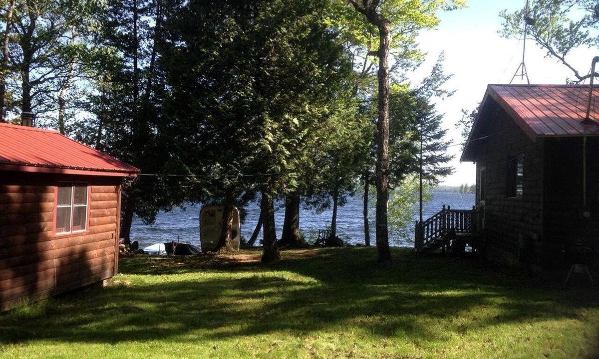 Brownville Cabin | Charming Lakefront Cabin Rental with a Fire Pit near Brownville, Maine