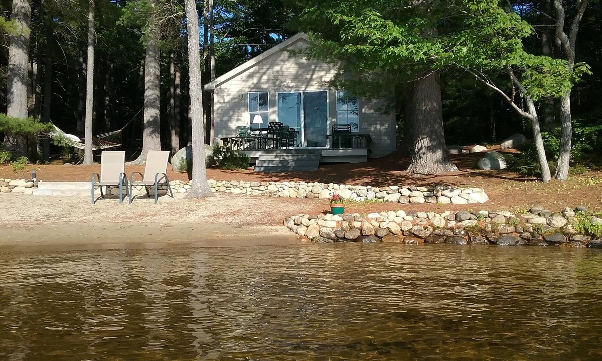 Milton Cottage | Charming lakefront cottage with sandy beach on a large private wooded lot