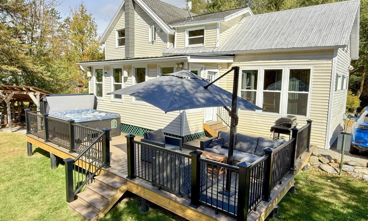 Montgomery Center House | Inviting riverfront home with hot tub on deck & fireplace, near skiing & golf