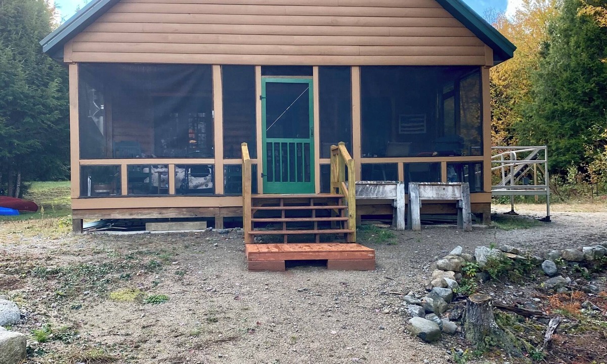 West Enfield Cabin | Peaceful Off Grid cabin on Eskatassis pond that is perfect for relaxing stays.