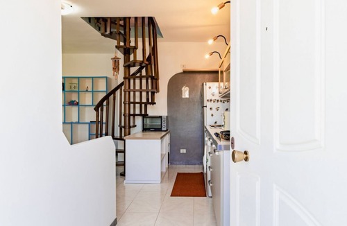 Olmedo Apartment | A charming 70 square meters apartment, perfect for six people, located on the first floor of a renovated terraced building (no elevator).The property is located in Olmedo, a small town in northwestern Sardinia, nestled inland between Alghero and Sassari.
