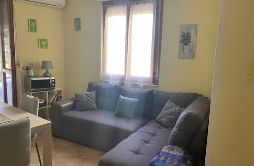 La Taulera Apartment | Alghero, Spiagge Bianca Maria Pia, beautiful veranda with outdoor kitchen
