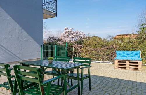 Arona Apartment | Apartment 'Bambù' with Private Garden, Balcony and Wi-Fi