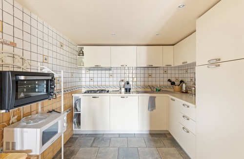 Bosa Historic Centre Apartment | Apartment 'Color Sabbia' with Balcony, Wi-Fi and Air Conditioning