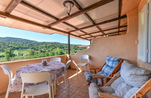 Porto Azzurro Apartment | Apartment 'Mono4Posti Vista Mare Il Portolano' with Sea View, Wi-Fi, and Air Conditioning