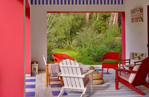 Marina di Bibbona Villa | Beach front Casa Rossa, a modern seaside villa, surrounded by a beautiful garden with lawn and r.