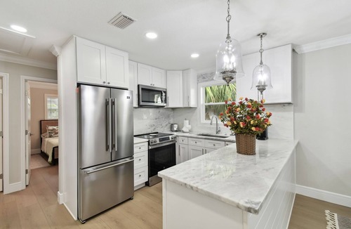 Indian Rocks Beach Apartment | Beach Retreat 2BR/2BA Steps to Indian Rocks & Clearwater + Hot Tub