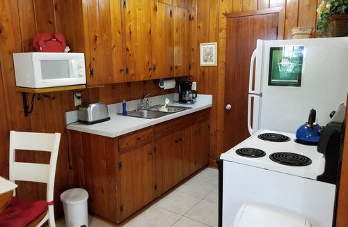 Indian Rocks Beach Cottage | Beachfront Cottages PATIO at Beautiful Sandy Shores on the Gulf of America