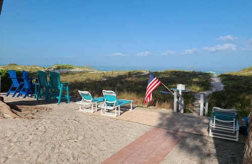 Indian Rocks Beach Cottage | Beachfront Cottages PATIO at Beautiful Sandy Shores on the Gulf of America
