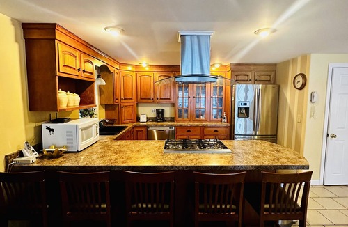 North Penobscot House | Beautiful and private lakefront home on the sandy shores of South Twin Lake