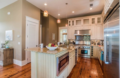 Watercolor House | Beautiful Camp District Retreat with Wraparound Decks and Beach Club Access