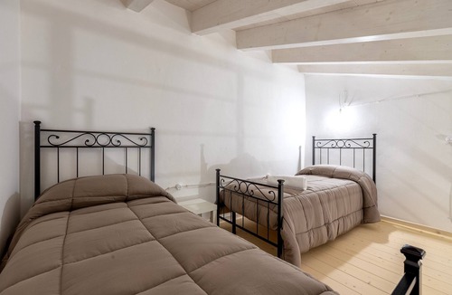 Pozzomaggiore Bed & Breakfast | Bed and Breakfast 'Camera Nuraghe Ruggiu' with Private Terrace, Wi-Fi and Air Conditioning