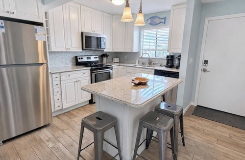 Holiday Isle Condo | Boat, Beach & Relax at SPC 3106 Canal-Front Condo + FREE Beach Service!