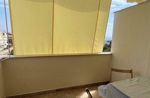Fertilia Apartment | BRIGHT APARTMENT WITHIN WALKING DISTANCE FROM THE SEA