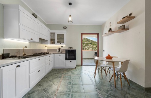 Buggerru House | Buggerru Hugo Holiday Home with Sea View, Private Terrace and Air Conditioning