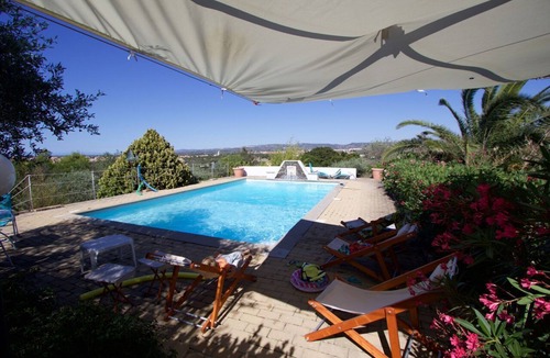 Sassari Villa | Casadellameridiana Family villa set in an olive grove, with views and swimming pool.