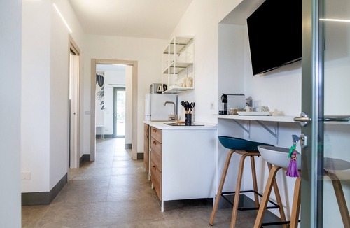 Saline Sadun Apartment | Casale Lorenzo - Apartment 1 with Private Terrace, Shared Garden and Air Conditioning