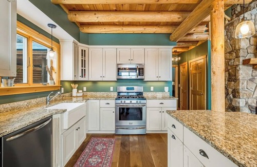Rumford Center House | Cedar log home w/large deck, game room, views & skiing nearby