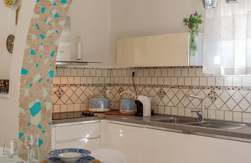 Eden Beach Villa | Cosy apartment in villa for 5 guests with WIFI, pool, A/C, TV and patio