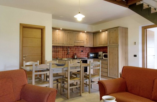 Santa Maria La Palma Apartment | Elegant 130 square meter residence on two levels, at ground floor, perfect for groups of up to 9 guests.Four bedrooms with double or twin beds (one with an extra bed). It features two bathrooms, a spacious living room, and a fully equipped kitchen.A priv