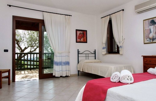 Santa Maria La Palma Apartment | Elegant 130 square meter residence on two levels, at ground floor, perfect for groups of up to 9 guests.Four bedrooms with double or twin beds (one with an extra bed). It features two bathrooms, a spacious living room, and a fully equipped kitchen.A priv