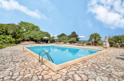 Santa Maria La Palma Apartment | Elegant 130 square meter residence on two levels, at ground floor, perfect for groups of up to 9 guests.Four bedrooms with double or twin beds (one with an extra bed). It features two bathrooms, a spacious living room, and a fully equipped kitchen.A priv