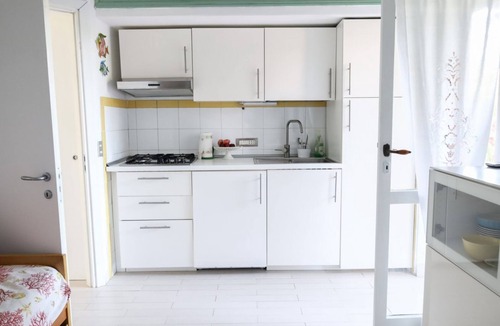 Pischina Salida Apartment | GuestHost - Comfy Flat W/Pool, Tennis Court & Private Beach!