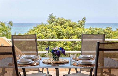 Platamona House | Holiday Home 'Casa In Residence Villa Marina' with Sea View, Shared Pool and Private Terrace