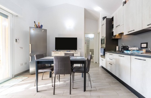 Buggerru House | Holiday Home 'Sole E Mare Buggerru - Appartamento' with Sea View, Private Terrace and Air Conditioning