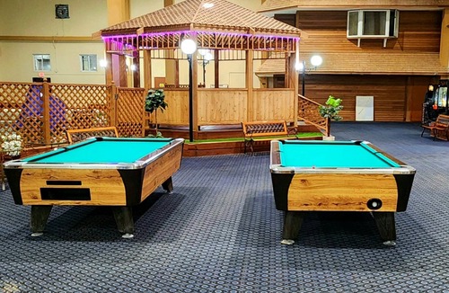 Sherman Station Apartment | King hotel suite with living room, large fridge/freezer in Millinocket, Maine