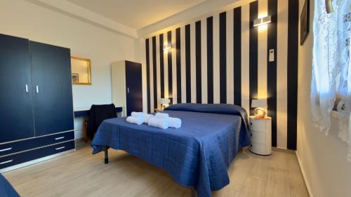 Follonica Apartment | L'Alice a Righe - Appartamento turistico
