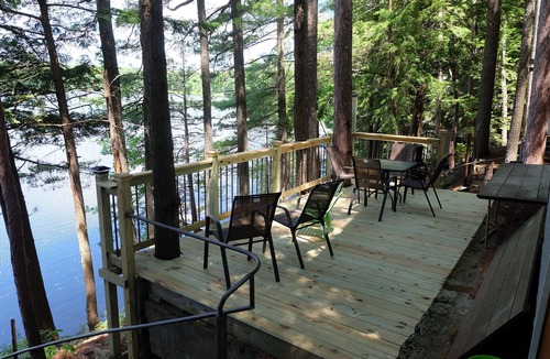 North Jay Cottage | Lake House with Swim Area, Dock, Deck, Canoe, & Paddle Boat - 1BR+, Sleeps 4-6