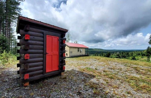 Grand Isle House | Off-Grid Cabin Nestled Among Nature with Lovely Landscape Views in Maine