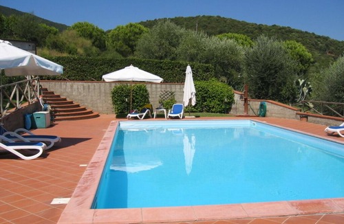 Castiglione della Pescaia Apartment | Part of a beautiful villa with pool and garden, 4km from the sea