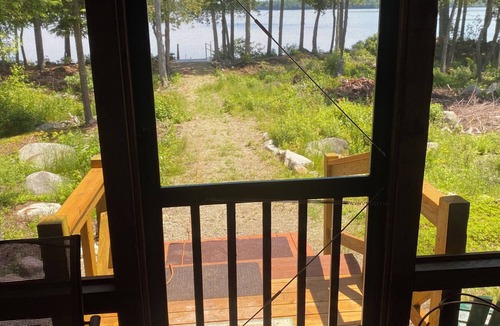 West Enfield Cabin | Peaceful Off Grid cabin on Eskatassis pond that is perfect for relaxing stays.
