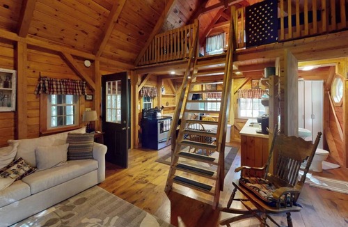 Lincoln Cabin | Quaint 1 Bedroom + Loft/1 Bath streamside Timber Frame cabin near Lincoln, ME.