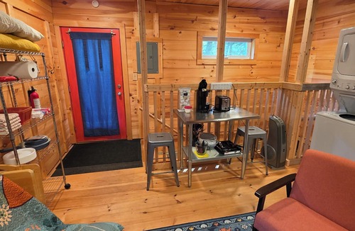 Charlotte Cabin | Round Lake Cabin. Escape to lake life close to amenities and attractions.
