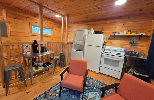 Charlotte Cabin | Round Lake Cabin. Escape to lake life close to amenities and attractions.