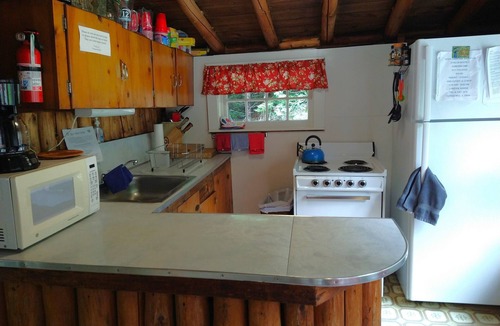 Dennysville Cottage | Rustic log cottage, River-view, Pet-friendly, Downeast Maine