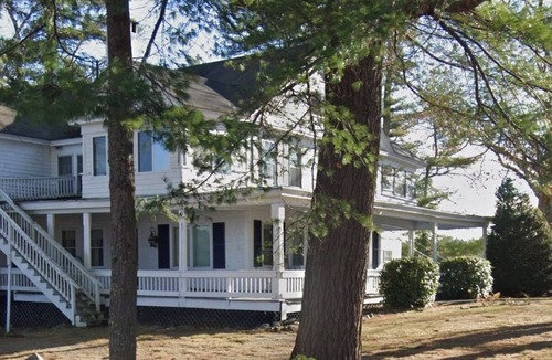 Standish Condo | Sebago Lake studio-style condo with enclosed sunroom and sunset views
