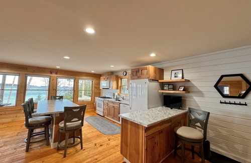 Steuben Cabin | Shoreline solitude, rustic, nestled between evergreens and Pigeon Hill Bay