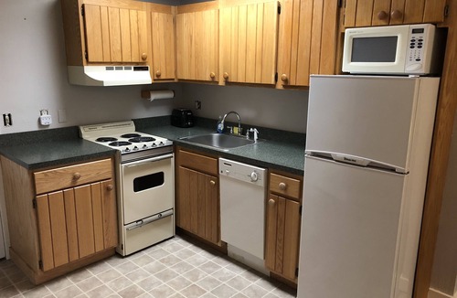 Carrabassett Valley Apartment | Ski In/Out at Sugarloaf Short Walk or Shuttle to Bars and Base Area Sleeps 4