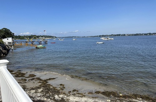 Mid-Coast and Islands Cottage | Step off the deck to enjoy the beach & a short walk down the scenic peninsula ~