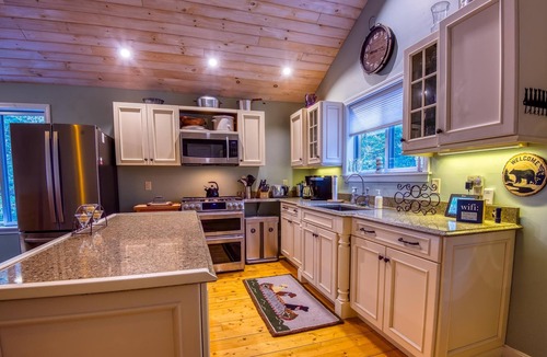 Rangeley Plantation House | The 4 Seasons on Mooselookmeguntic Lake with dock, mooring, 4 kayaks, fire pit, and pet friendly!