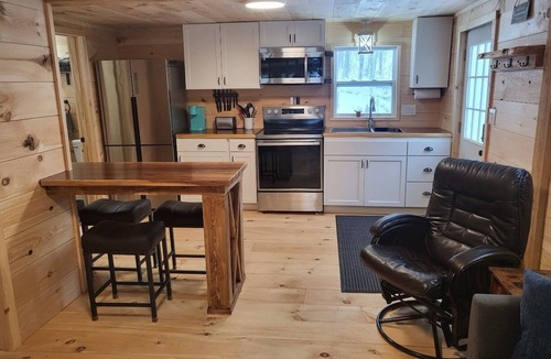 West Minot Cabin | Waterfront Cabin on dead end road with AC On Little Wilson in Turner