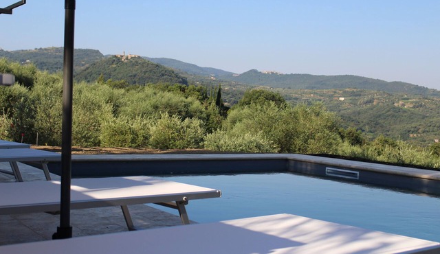 Beautiful natural stone house with pool in the middle of an olive grove
