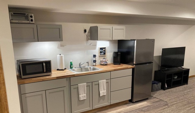 Comfortable Private room with bathroom and kitchenette.