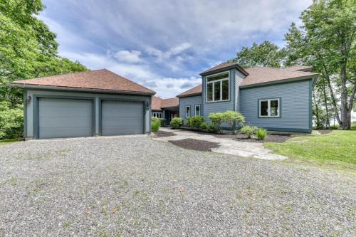 Delightful oceanfront home with amazing views, wrap-around deck & two fireplaces