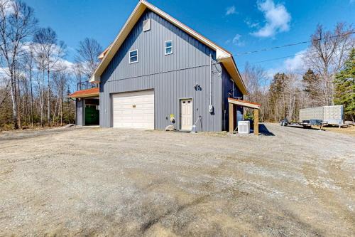 Dog-friendly apartment by Moosehead Lake with sprawling deck & firepit